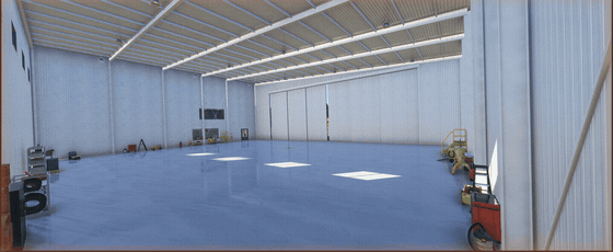 Montage: sliding hall doors part, a bifold door lifts, doors open from inside, and an aircraft taxis in from the apron